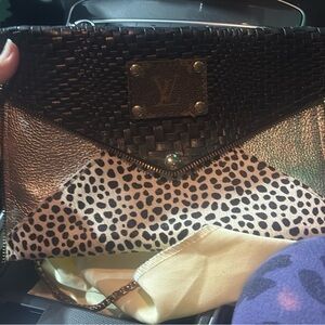 Louis Vuitton Black and Gold Clutch with Animal Print